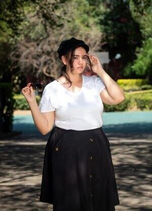 Plus size black skirt with white top 