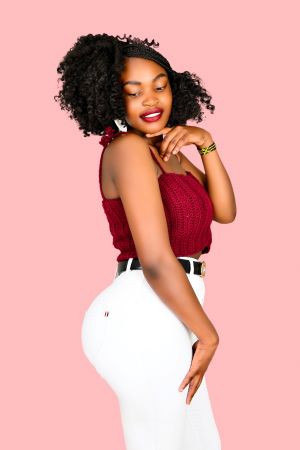 Crop top in maroon and white trousers