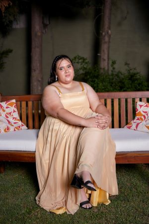 Plus size woman wearing flared organza dress
